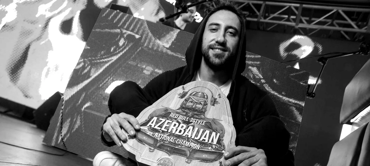 DJ TIM holding the Red Bull 3Style Azerbaijan National Champion trophy, 2017